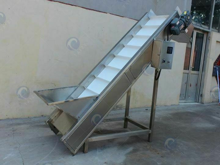 Transportador de elevação